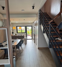 entrance way with dining room and kitchen view