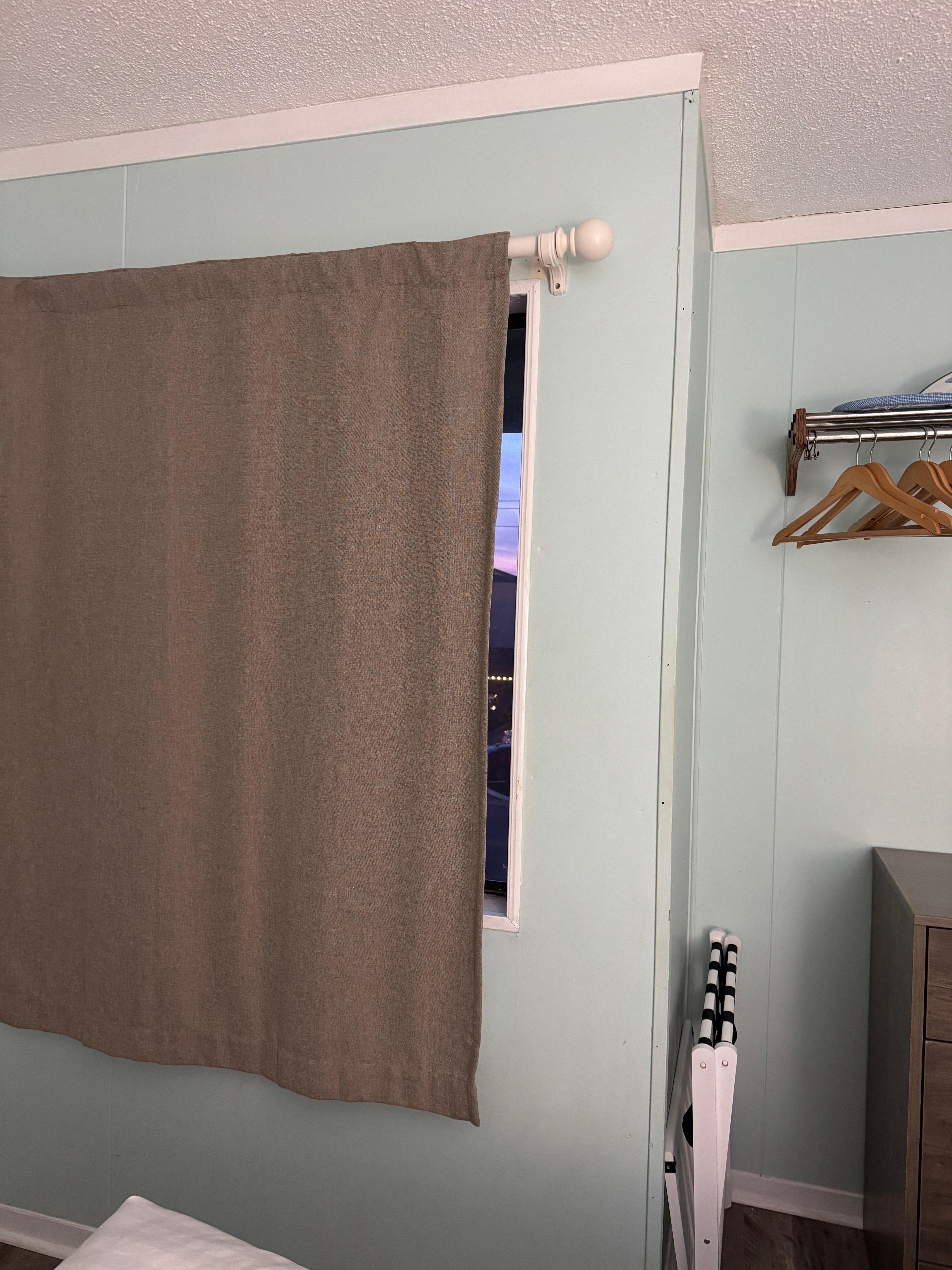 Didn’t even hang a curtain set in the bedroom? They had 1 panel up that didn’t cover the window and let a lot of light in all night.