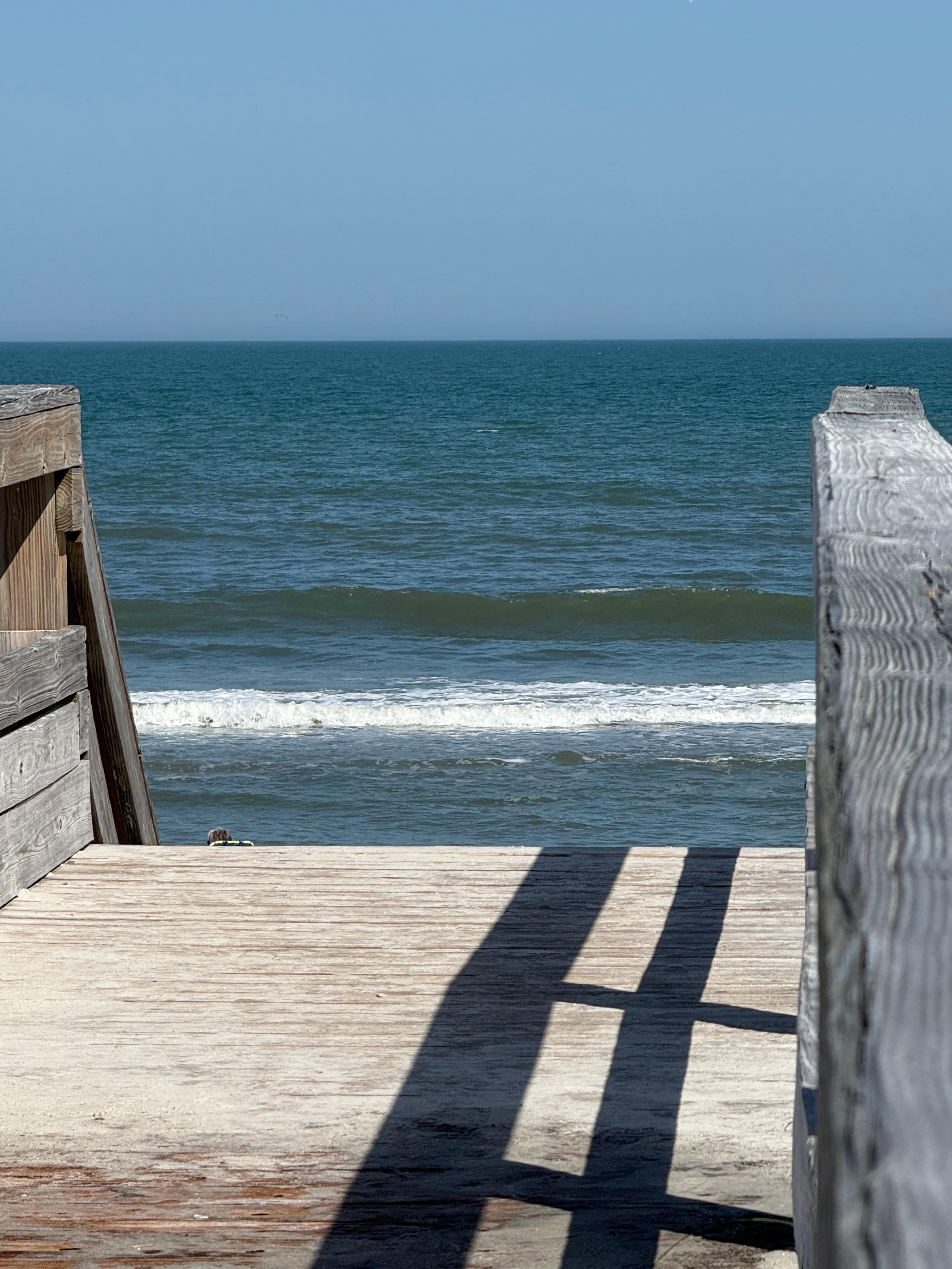 Private walkway to beach from condo building.
