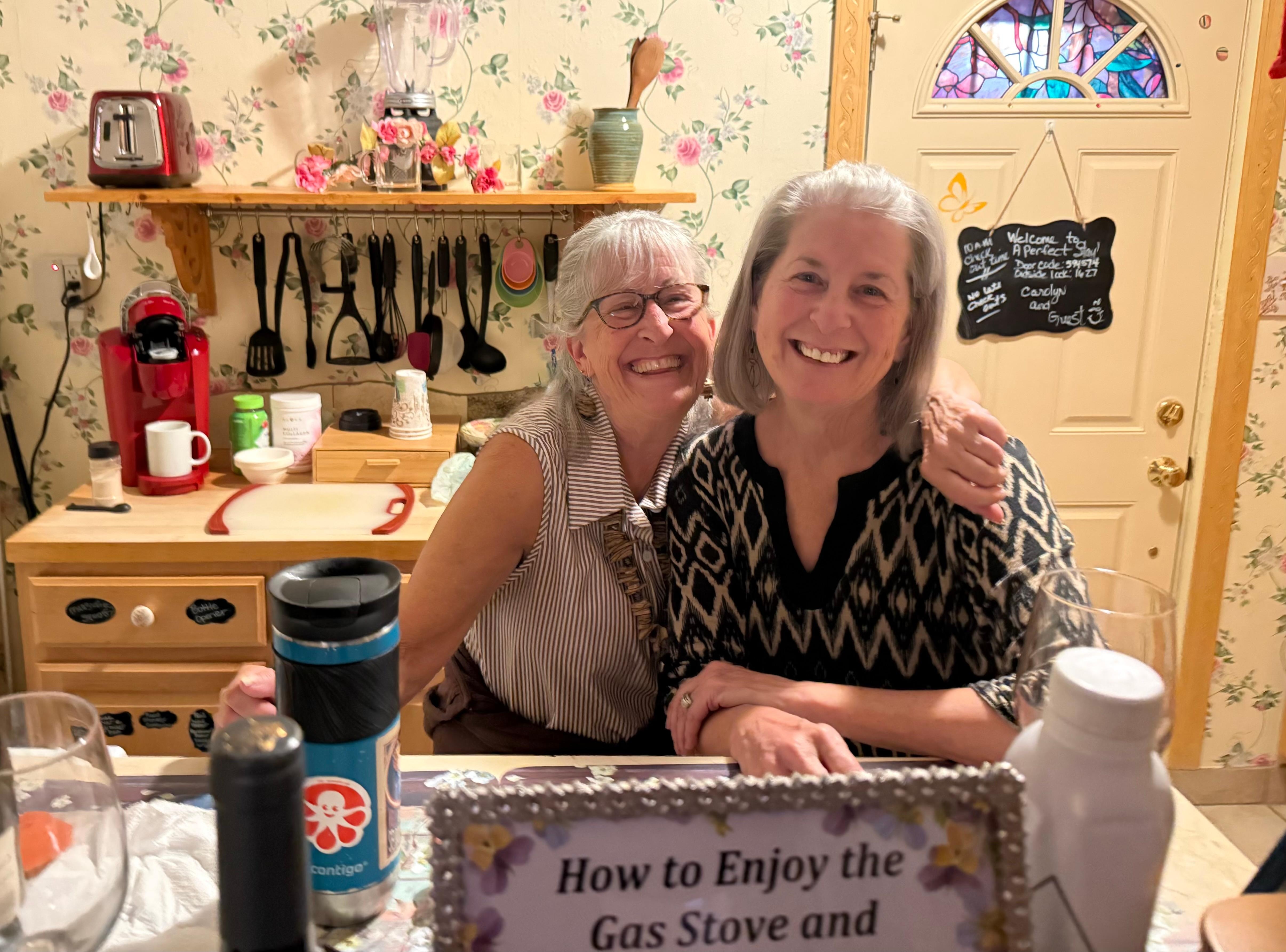 My twin sister & I in the cute little kitchen - had all the necessities!