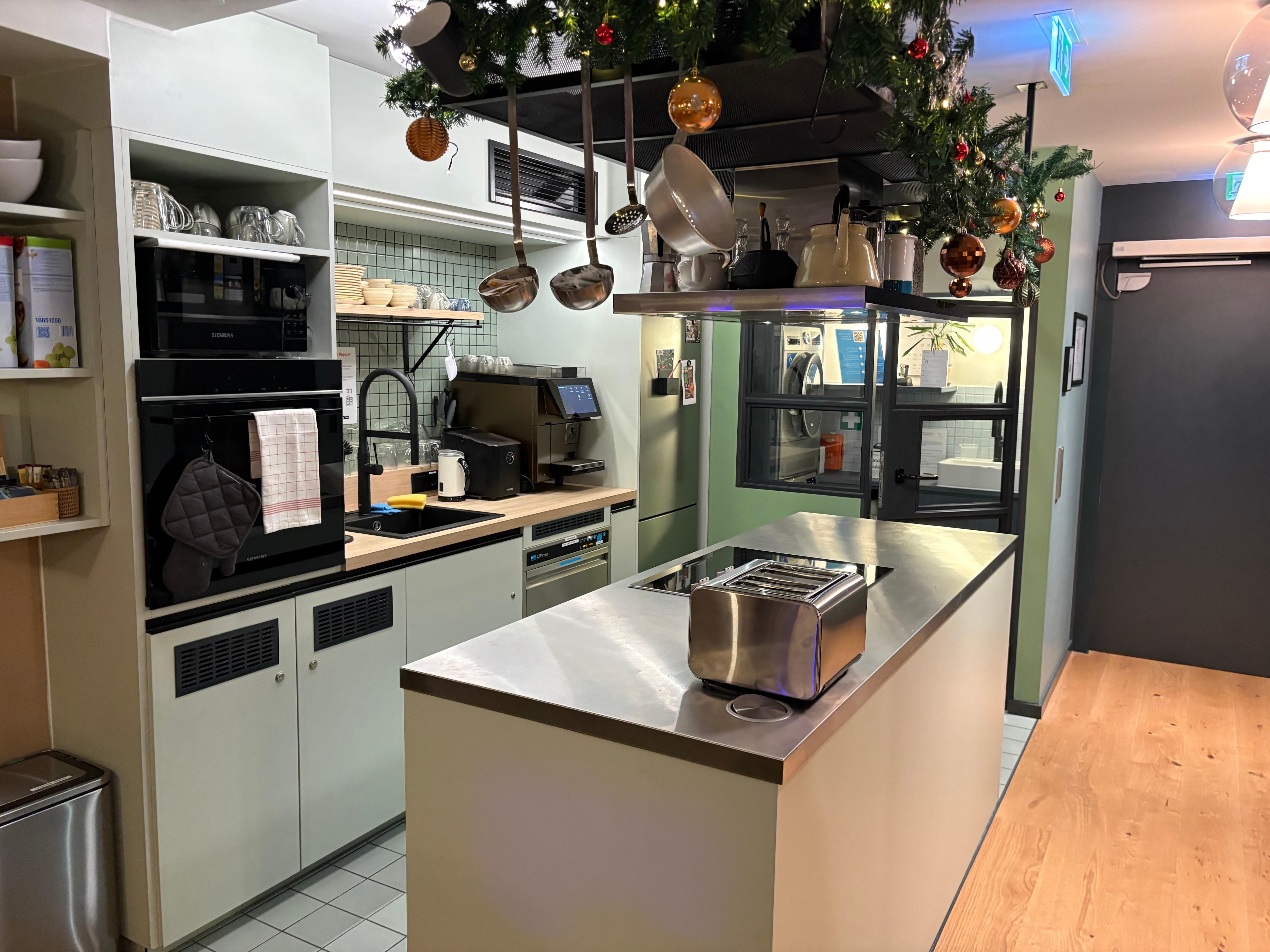 Communal kitchen and laundry.