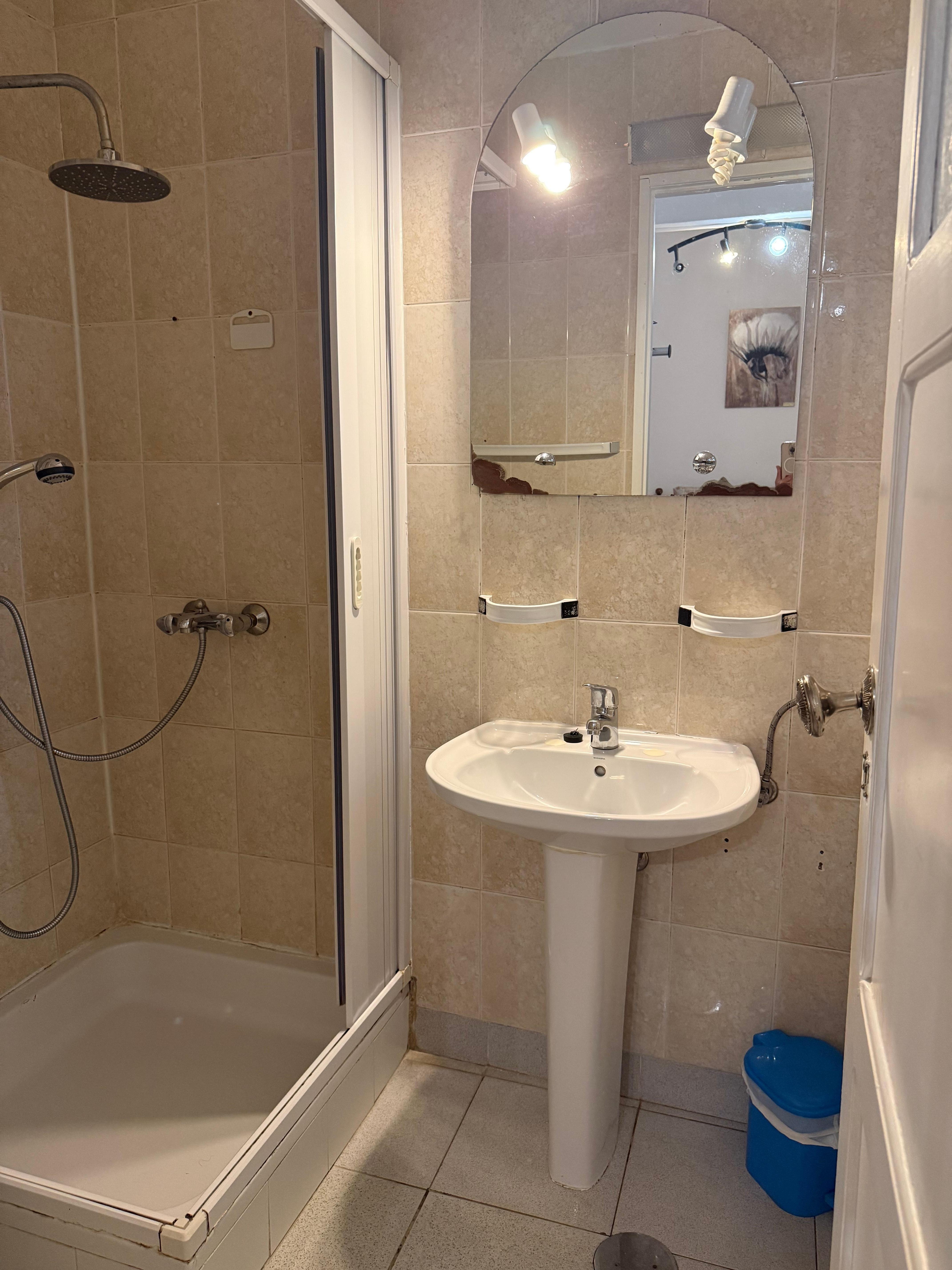 The mirror and shower stall were broken 