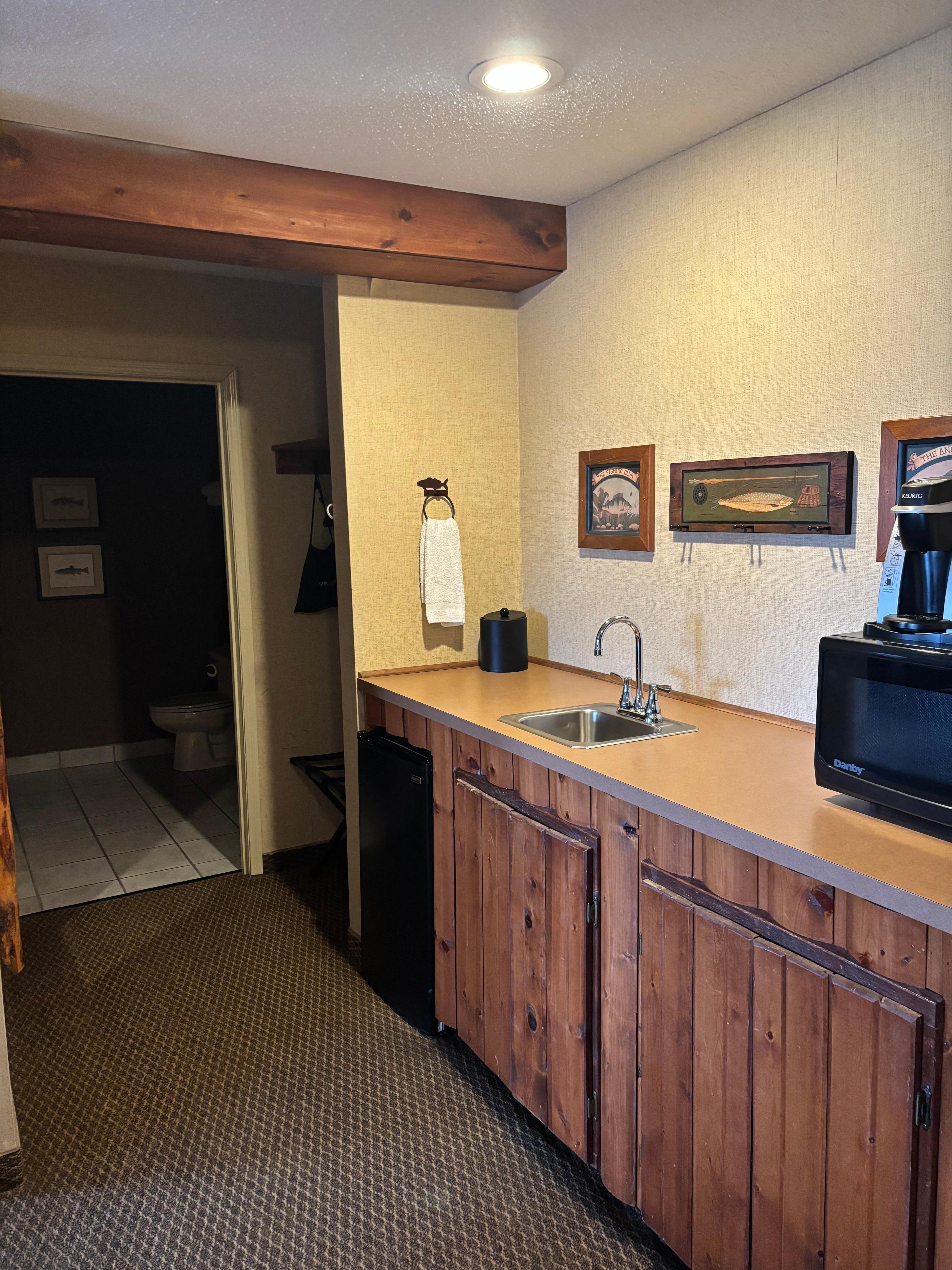 Kitchenette has lots of storage 