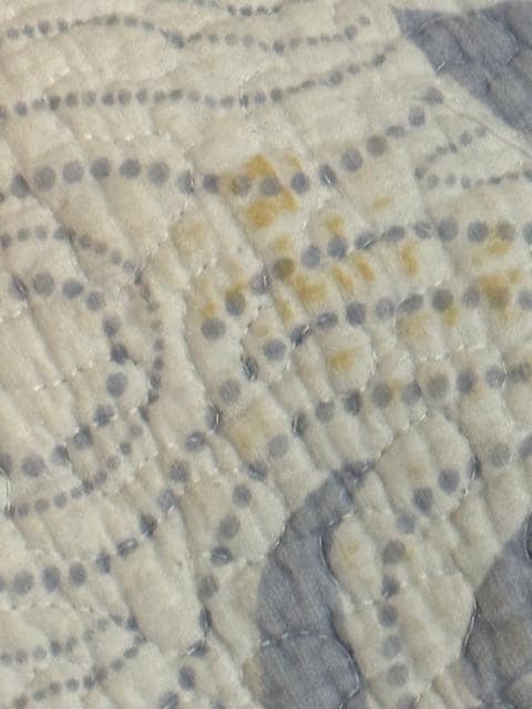 Yellow stain on quilt