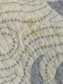 Yellow stain on quilt