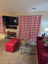 Living area with very large TV