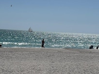 Beach and sailboat