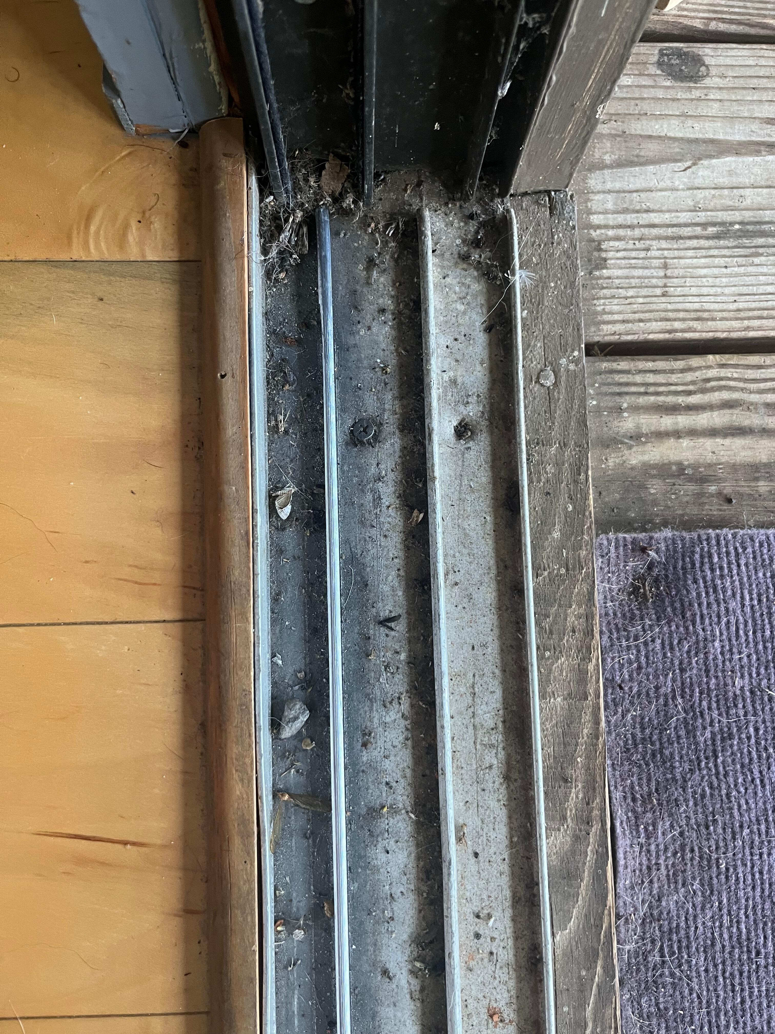 Inside sliding door track.