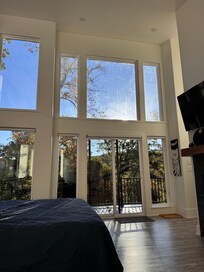 Beautiful view from the cozy yellow chairs with pullout footstools.