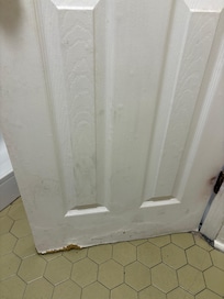 Water damage that had just been painted over. Similar action taken on base of walls in bathroom.