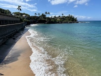 Beach and sea wall looking south