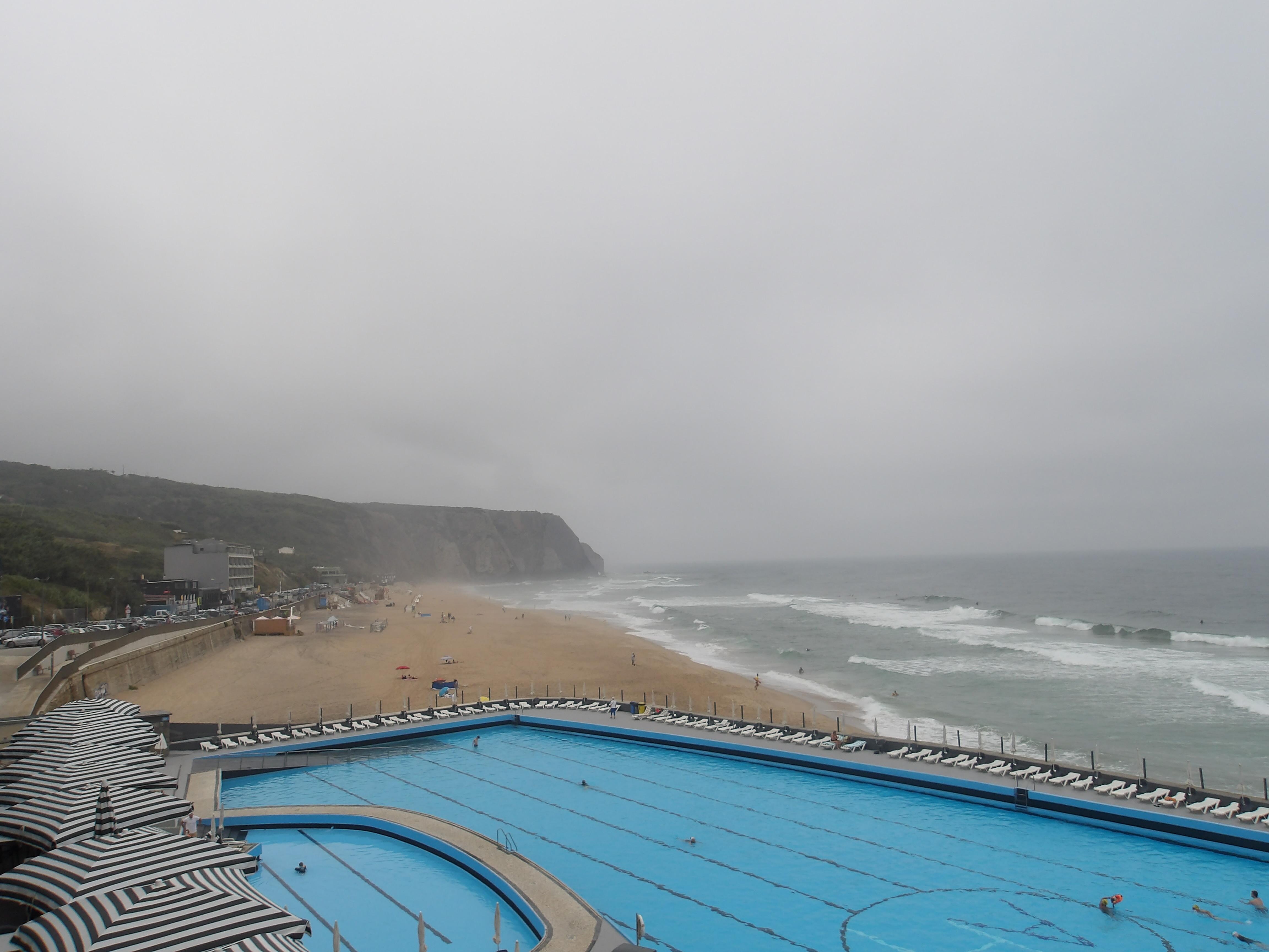 Pool and ocean balcony view. 