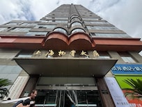 This is real picture of building outside, not Peace Hotel shown on the Expedia, also building is under renovation