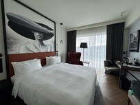 Bedroom is quite small but the floor to ceiling window makes up for the square footage.