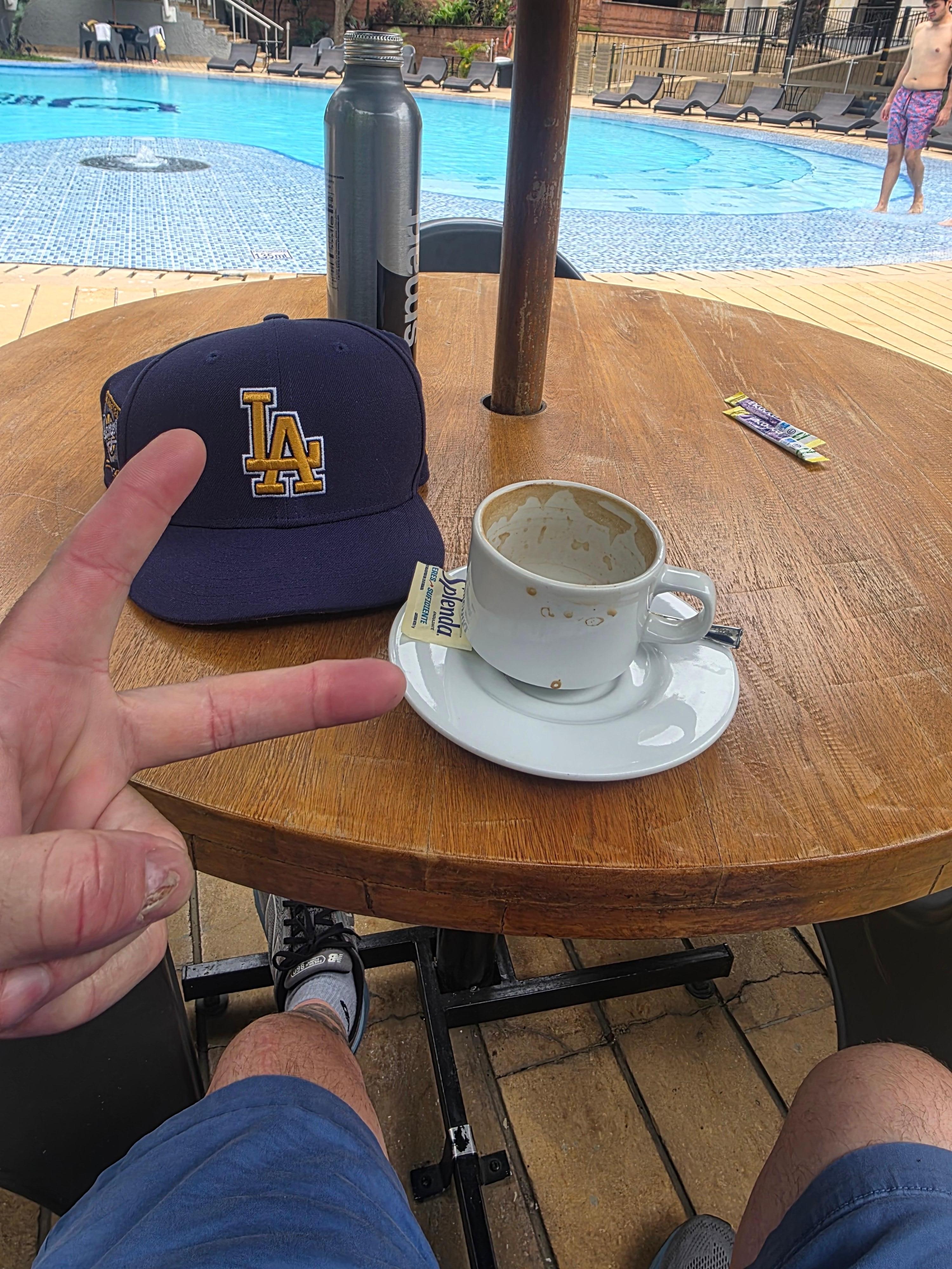 Latte at pool side waiting for room . Arrived a little early.