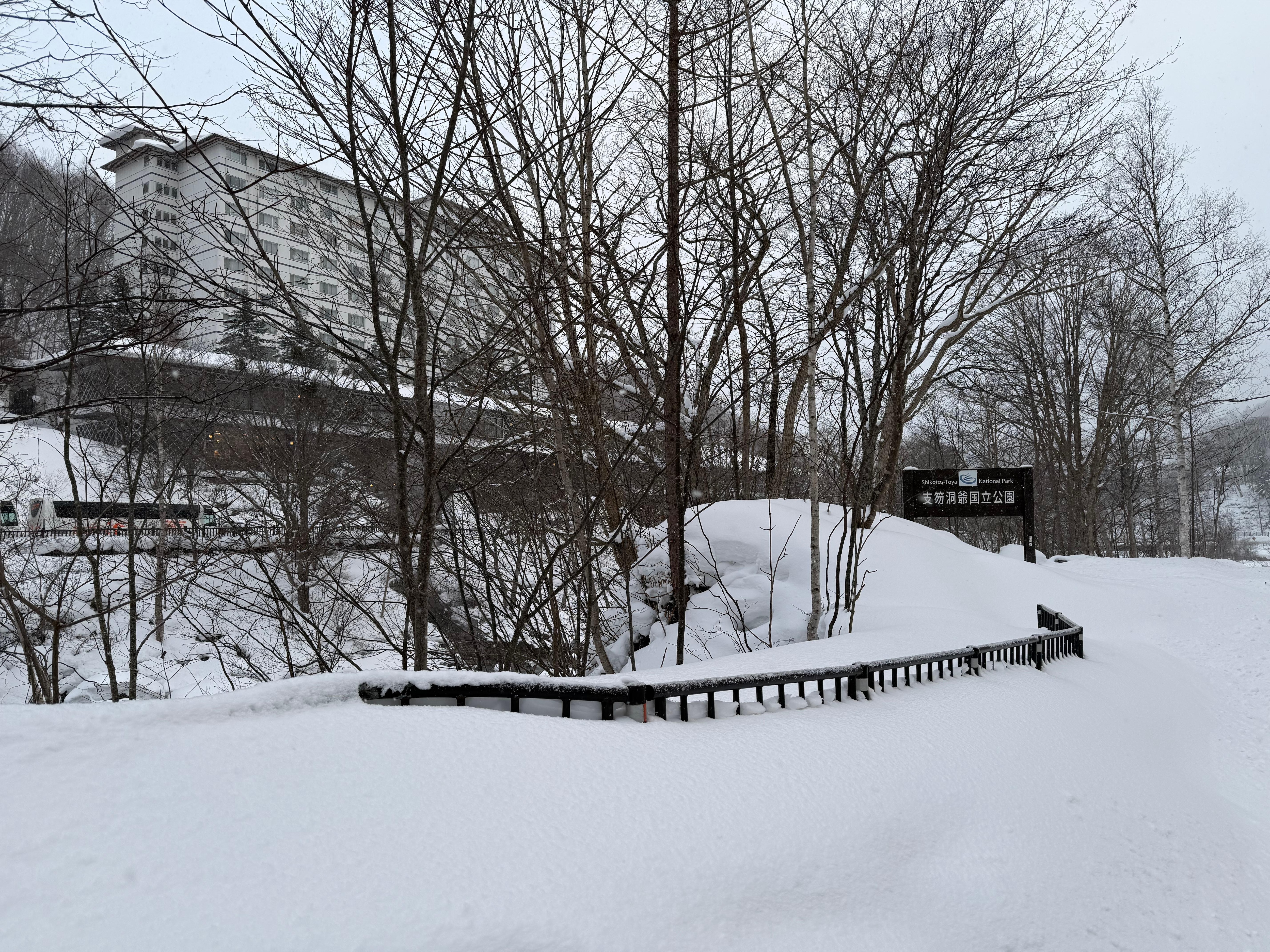 The view from across the river with the national park sign 