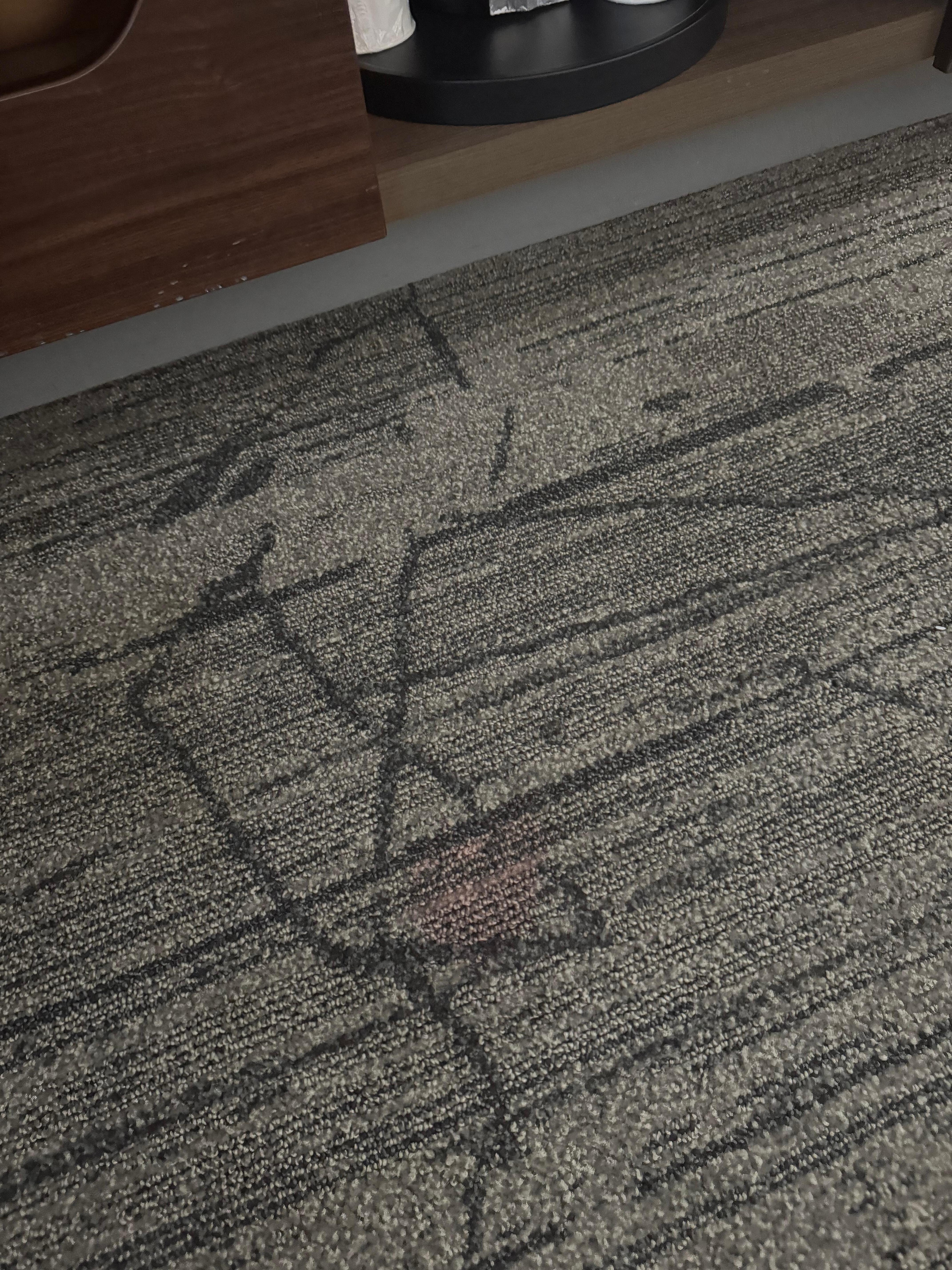 Red stains in carpet 