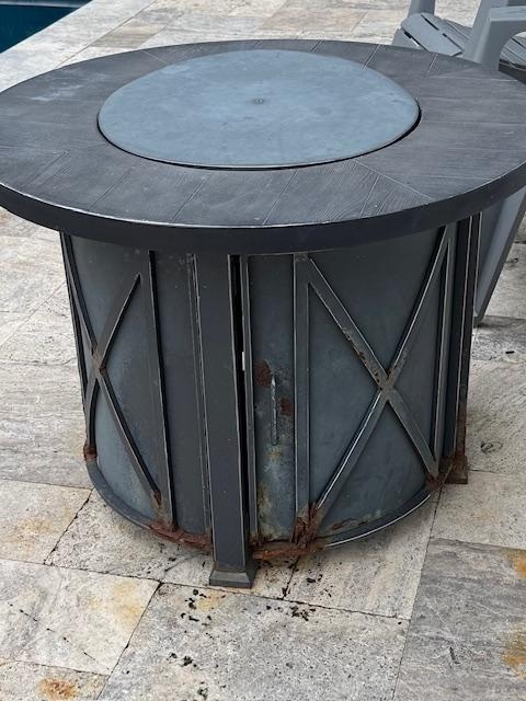 Rusted gas firepit. 