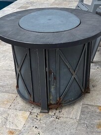 Rusted gas firepit.