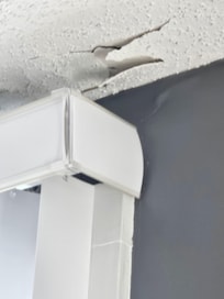 Ceiling chipping off.