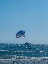view from beach. parasailing offered onsite.