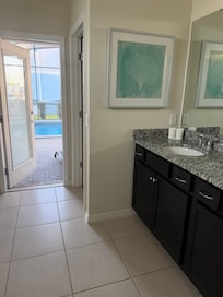 1st Master Bathroom with direct access to pool.