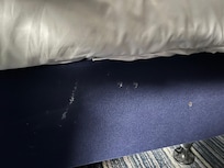 Stain on side of bed base