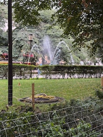 Park with fountain about one block away