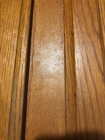 Greasy fingerprints on cabinets.