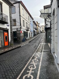 Street at cafe entrance.