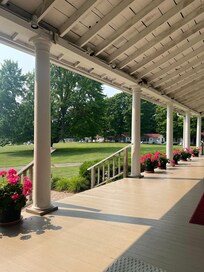 Relaxing porch view of the lake and grounds