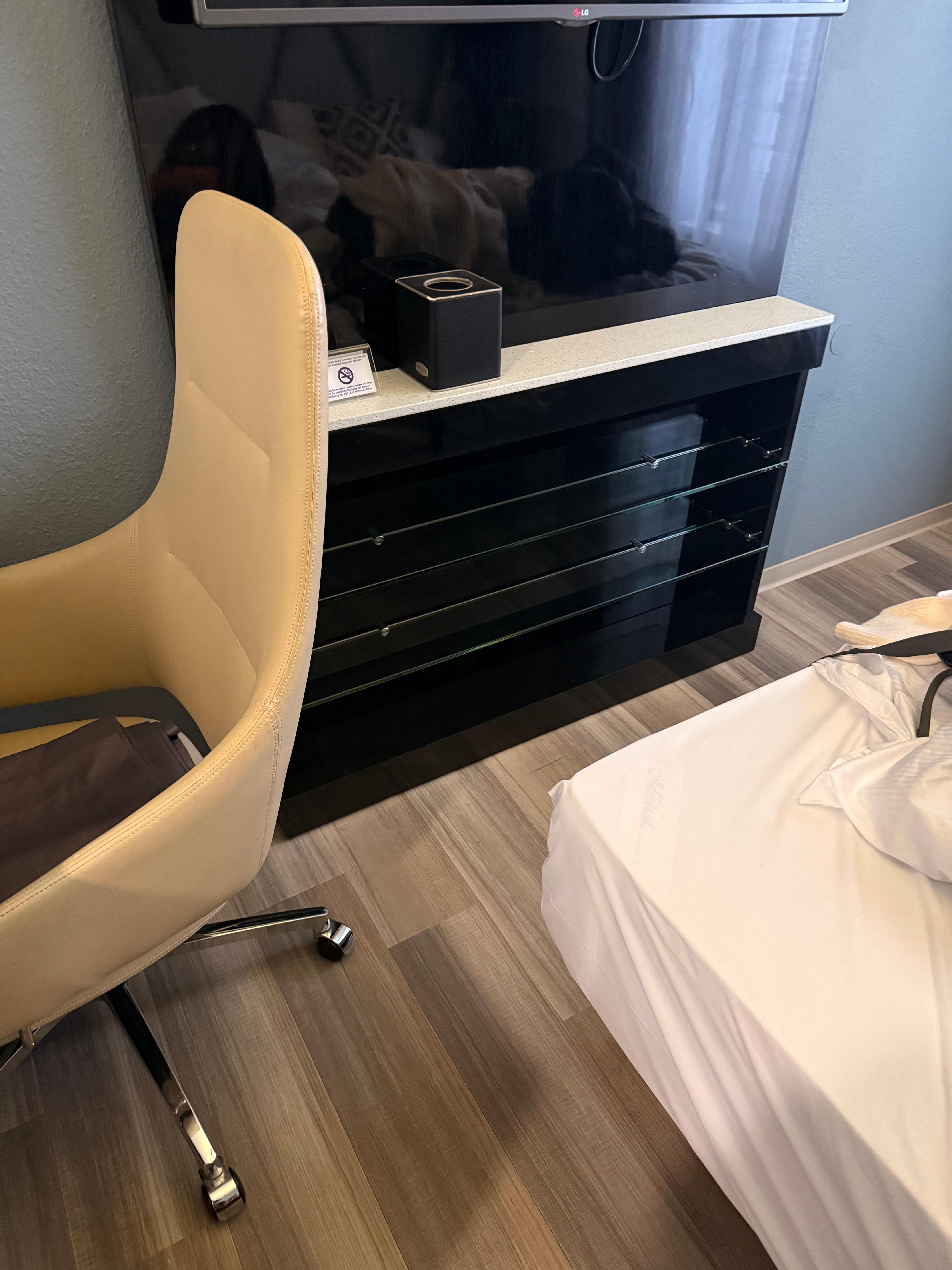 The space to move between the bed and chair - this couldn’t tuck in any more!