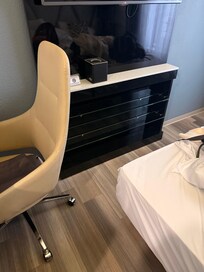 The space to move between the bed and chair - this couldn’t tuck in any more!