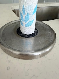 Dust on the paper towel holder.