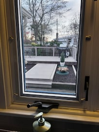 With deck & barbecue