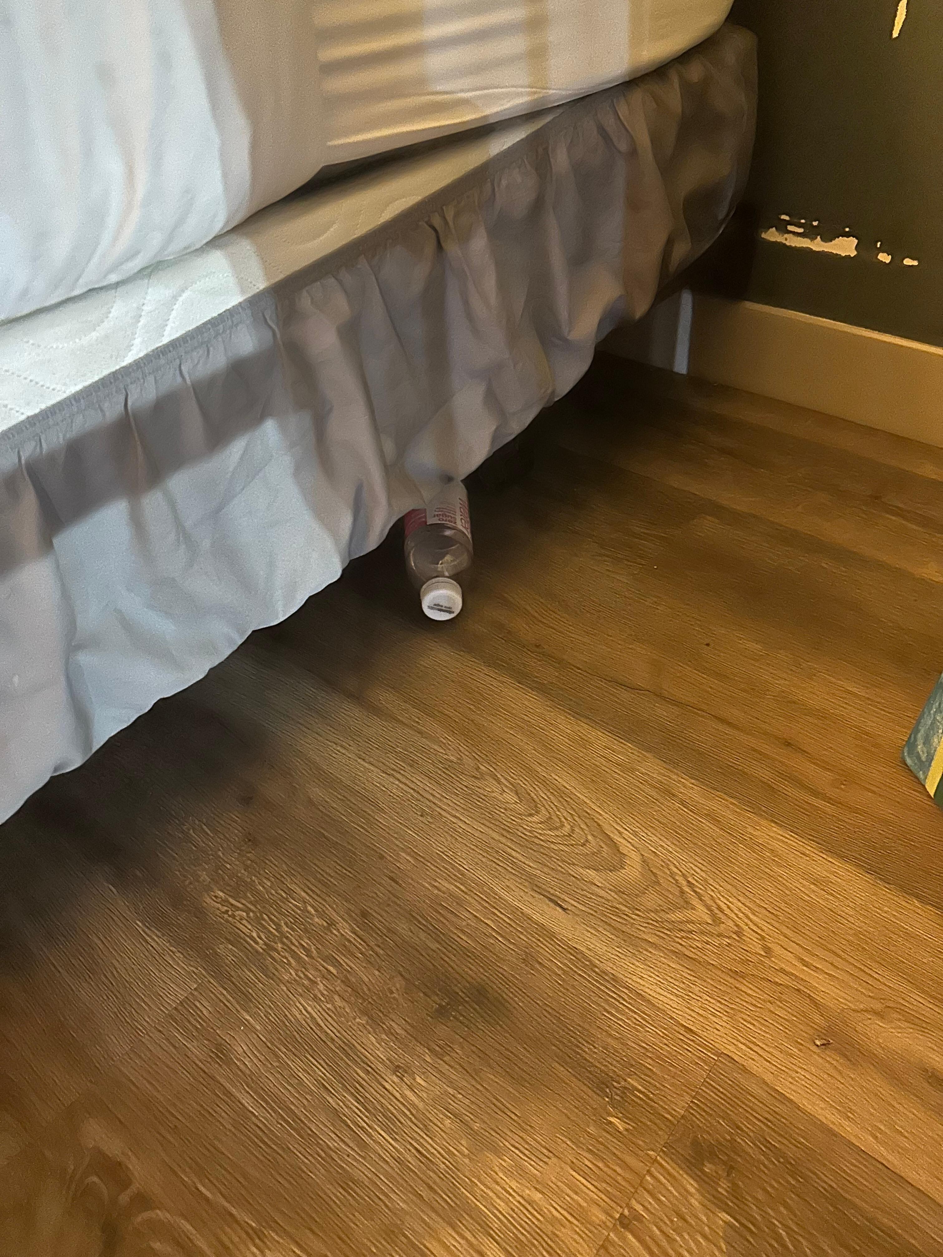 Trash from previous guest left under the bed.