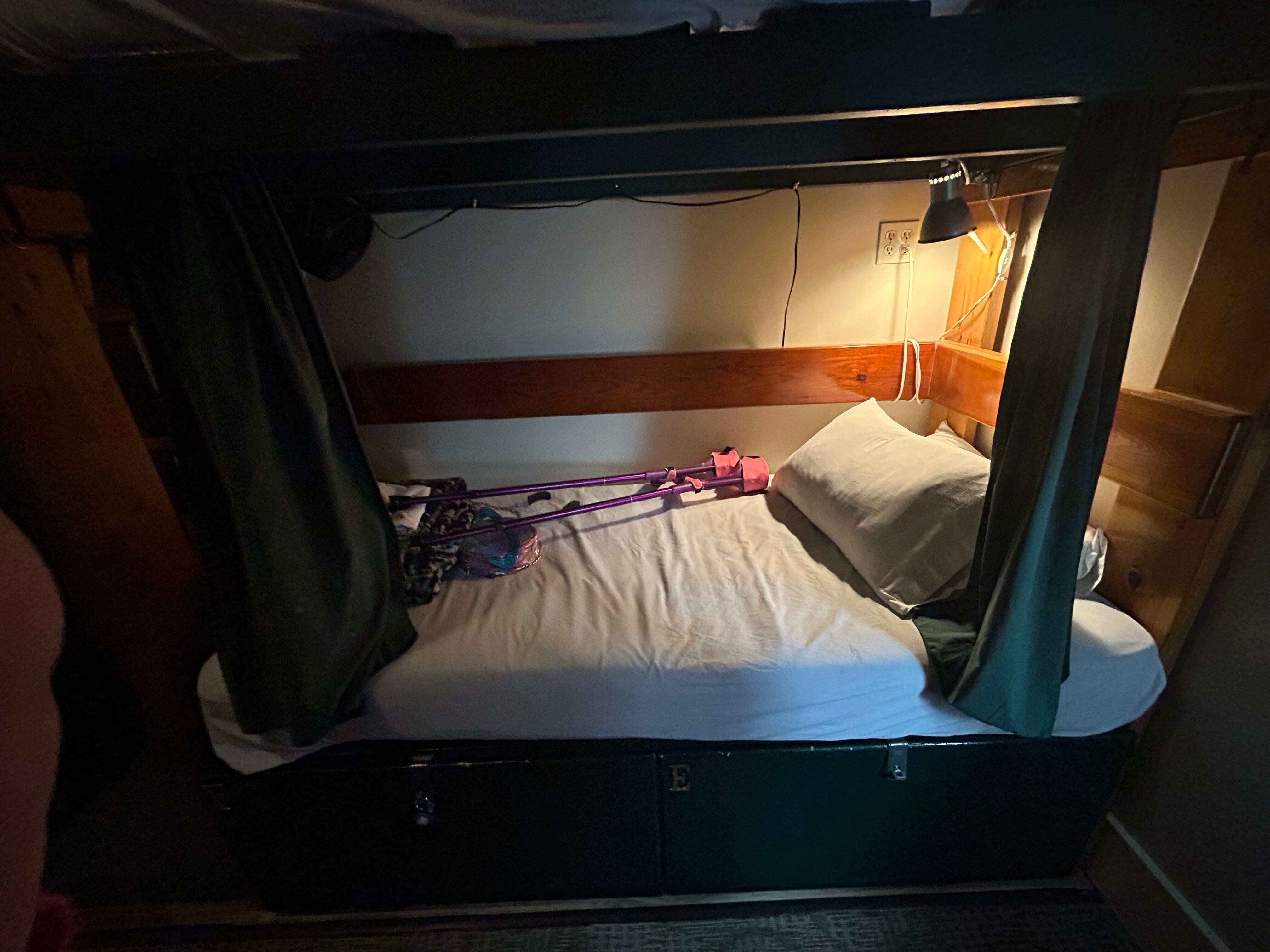 the little bed was cute, comfy, and had privacy curtains on all sides! the storage below also had plenty of room for all of my stuff and my crutches!