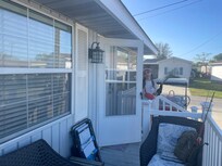 Perfect porch for morning coffee.