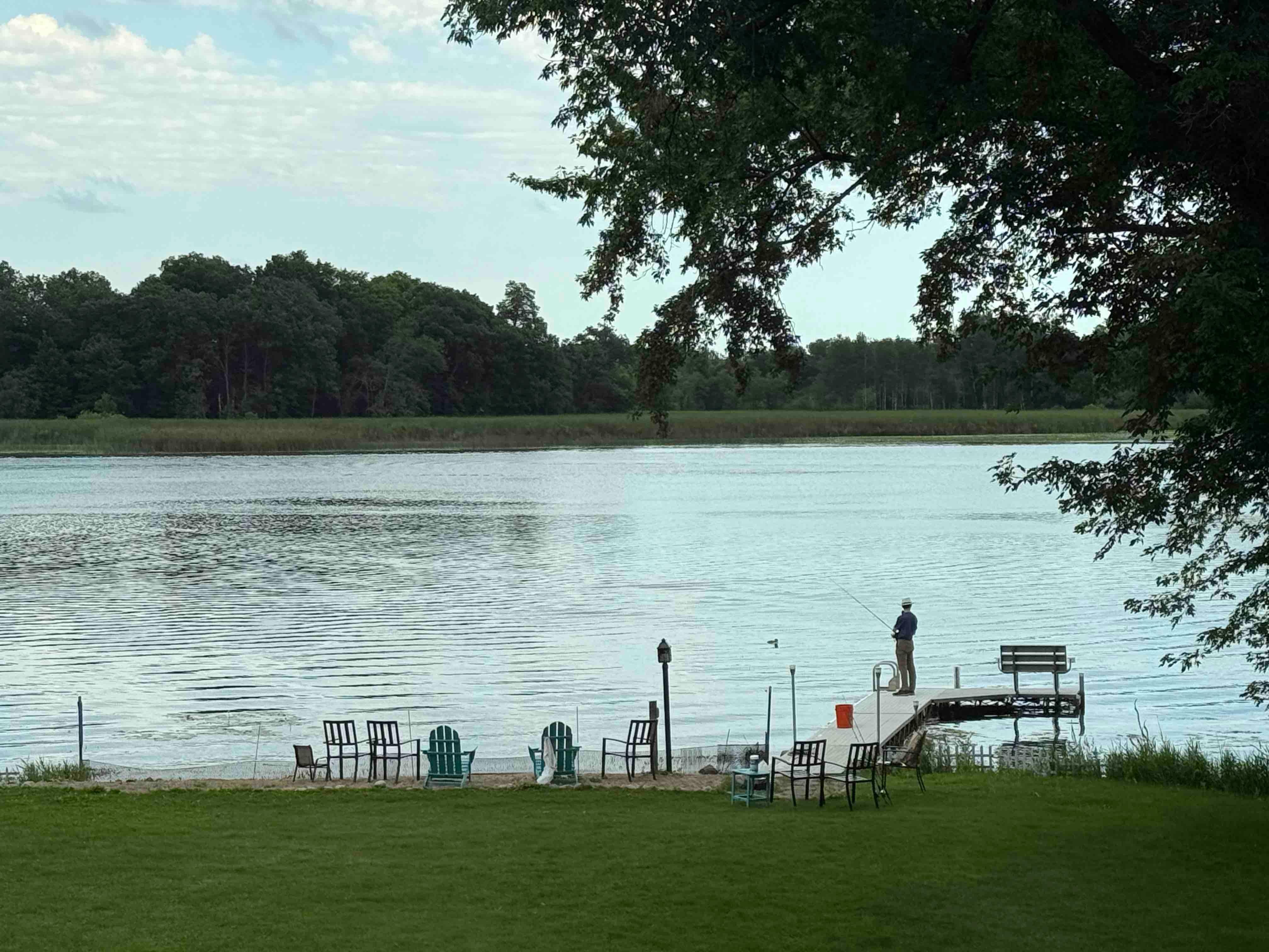 Fishing on the dock, loons visiting.
