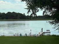 Fishing on the dock, loons visiting.