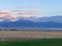 Sunset from the pack patio looking down the spine of the Madison Range.