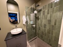 Beautiful shower in bathroom with heated floors