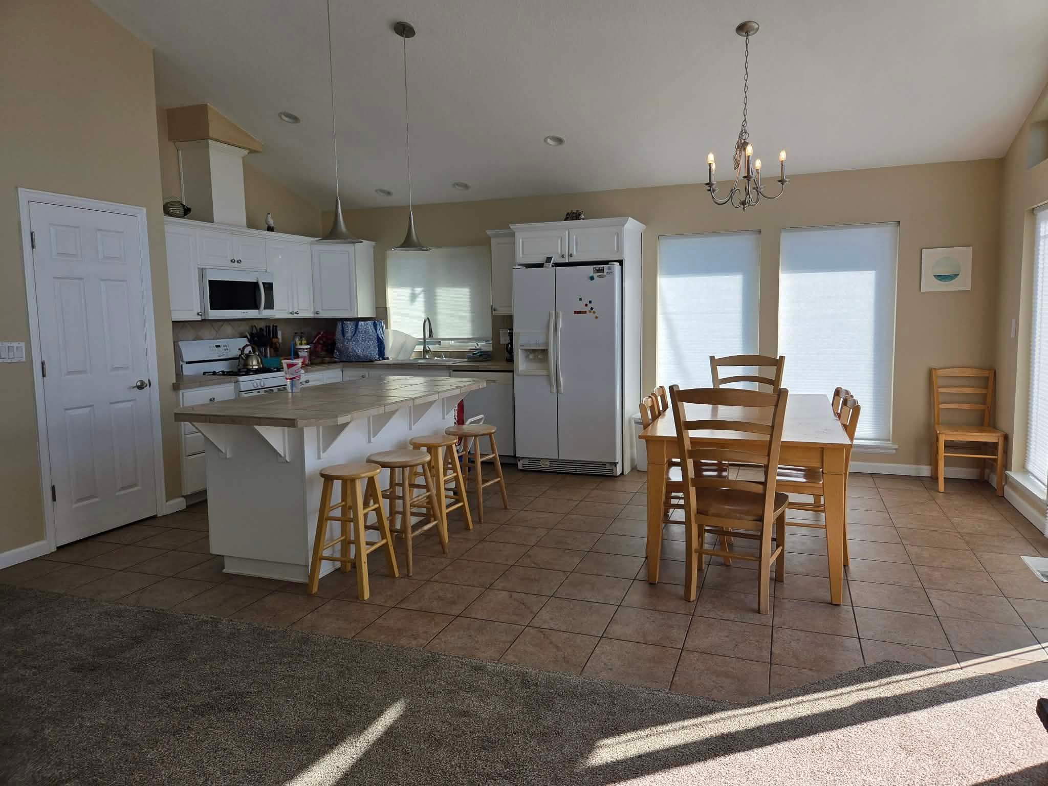 About 5 feet from the kitchen table was the gas burner. 