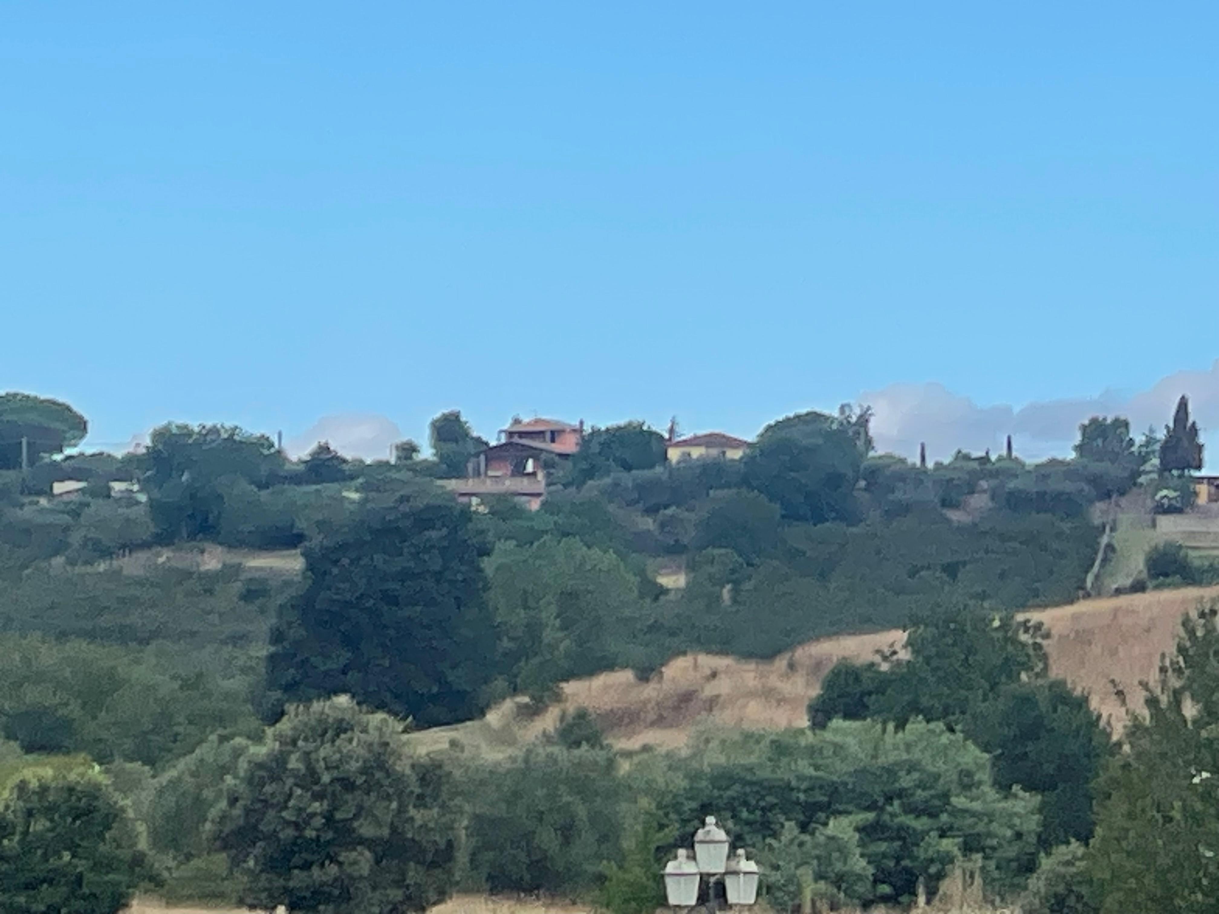 Het huisje vanaf de golfbaan in het dal
