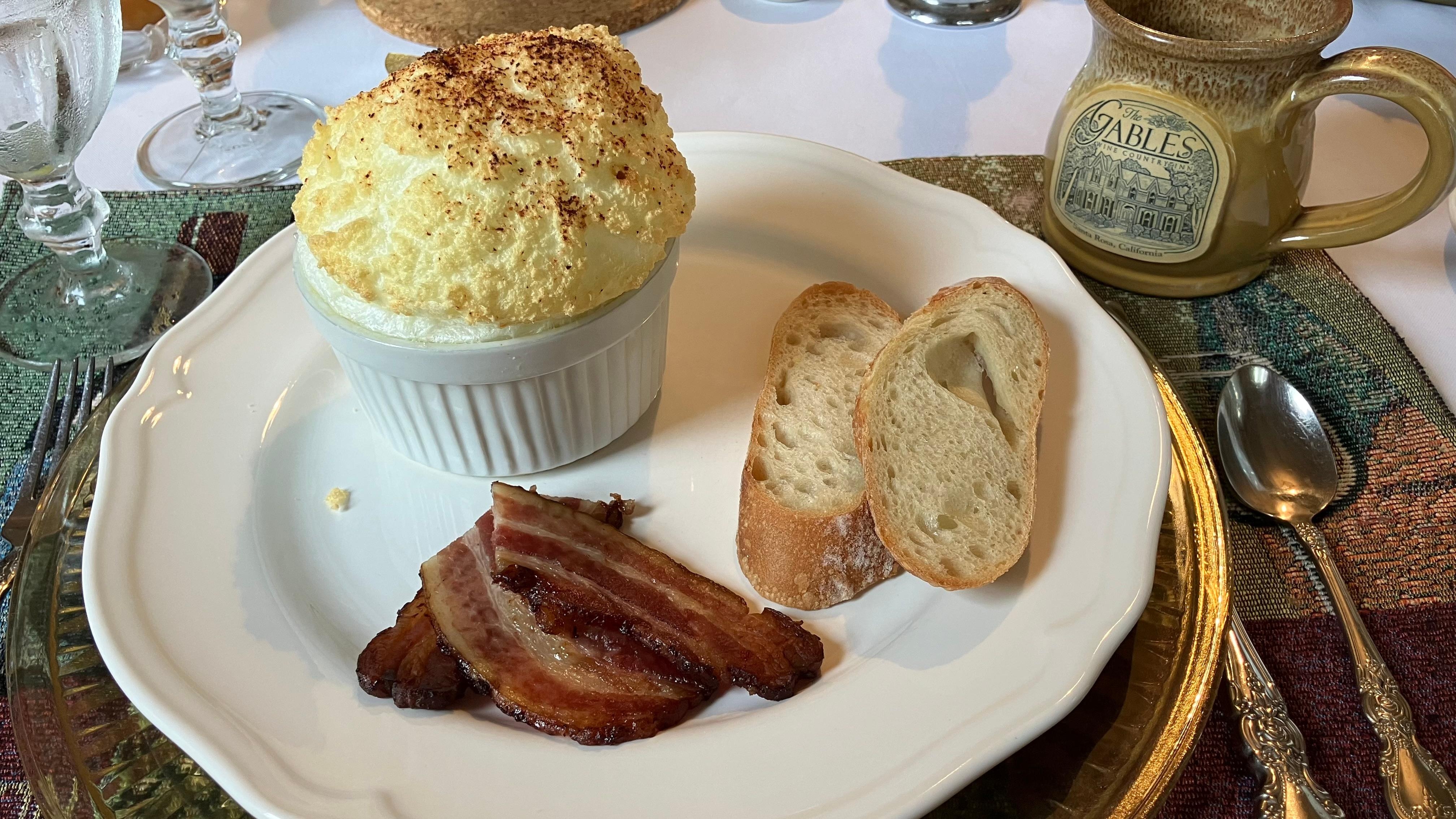 Breakfast 3rd course. Egg souffle with locally made and raised bacon. Delicious!