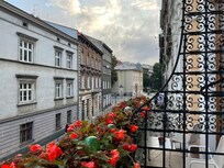 Taken from standard room balcony, supermarket at the corner and trees of park surrounding old city