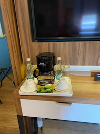 Inside room given two bottles of water.