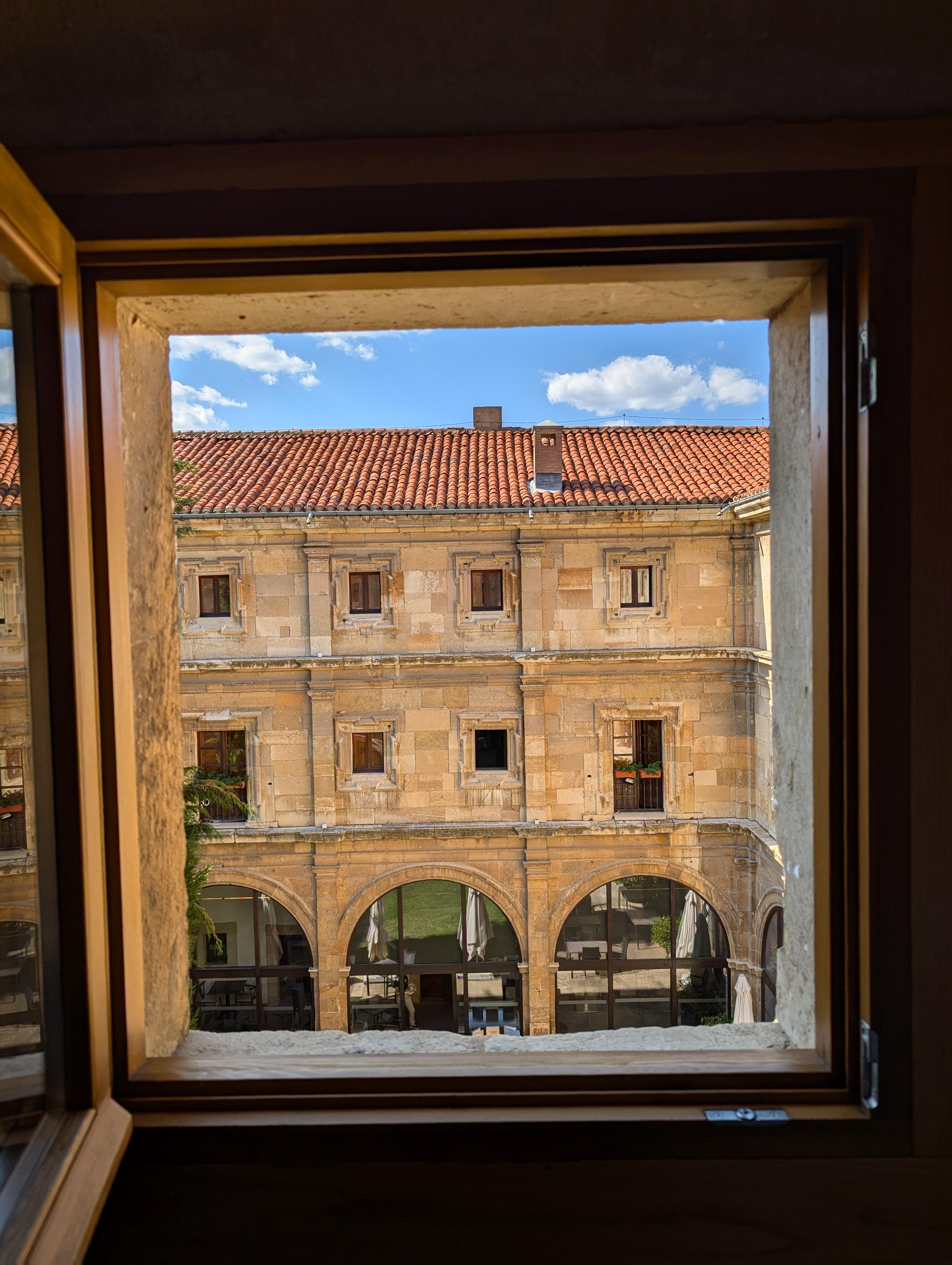 Looking through the room window. 