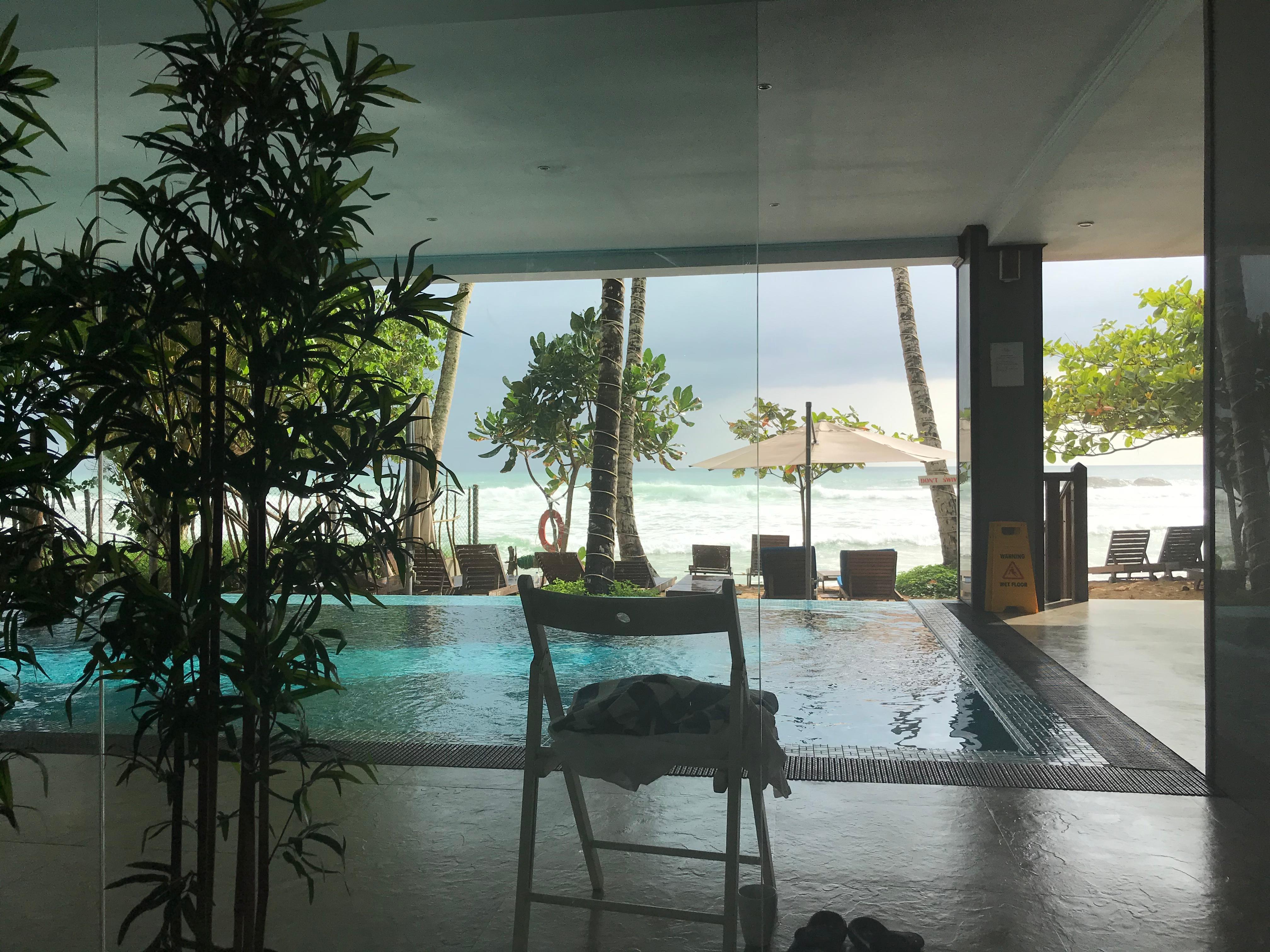 View from reception of pool through to beach