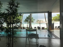 View from reception of pool through to beach